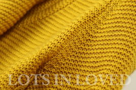 秋日暖意，經(jīng)典重生——品味大翻領(lǐng)粗棒針羊毛衫的溫暖時(shí)尚